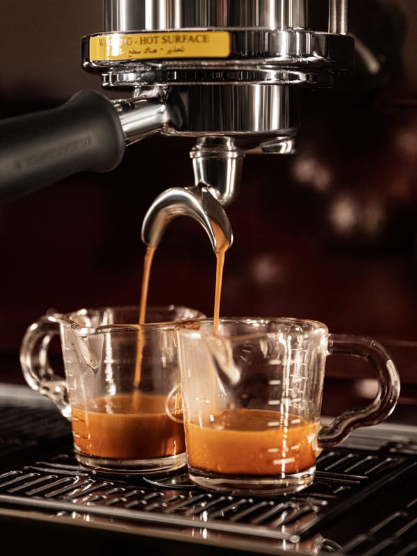 Espresso being extracted from a La Marzocco Strada at Studio Roast, Kuwait