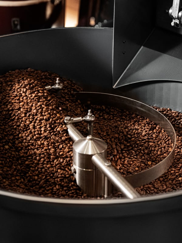 Coffee beans tumbling in the Studio Roast air roaster